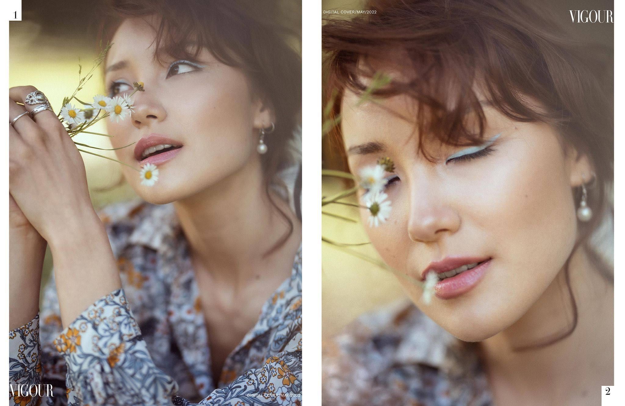 Vigour magazine spread with a model among wildflowers, a hat over her eyes