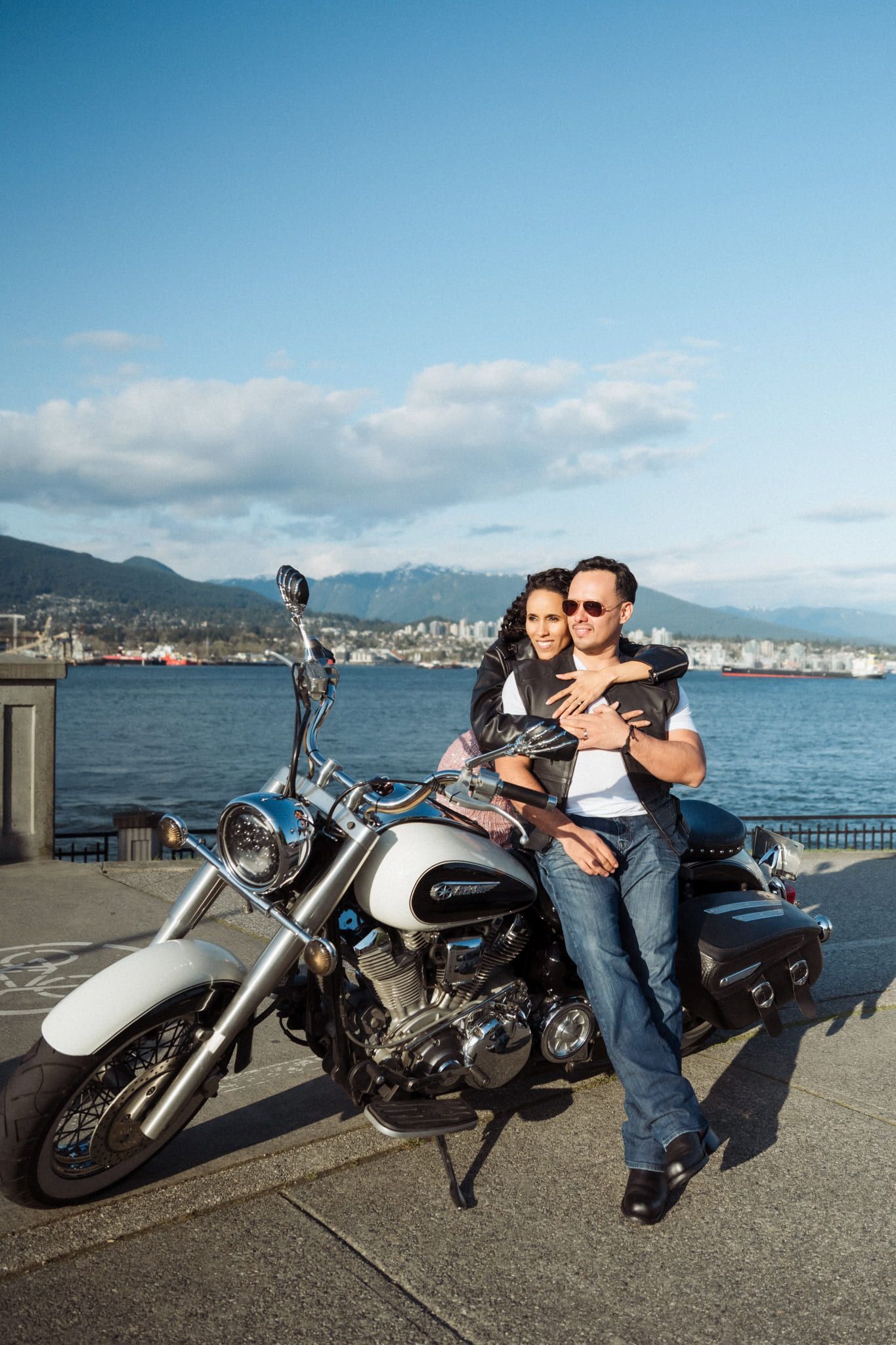 Intimate couples photography by the harbour, couple with a motorcycle
