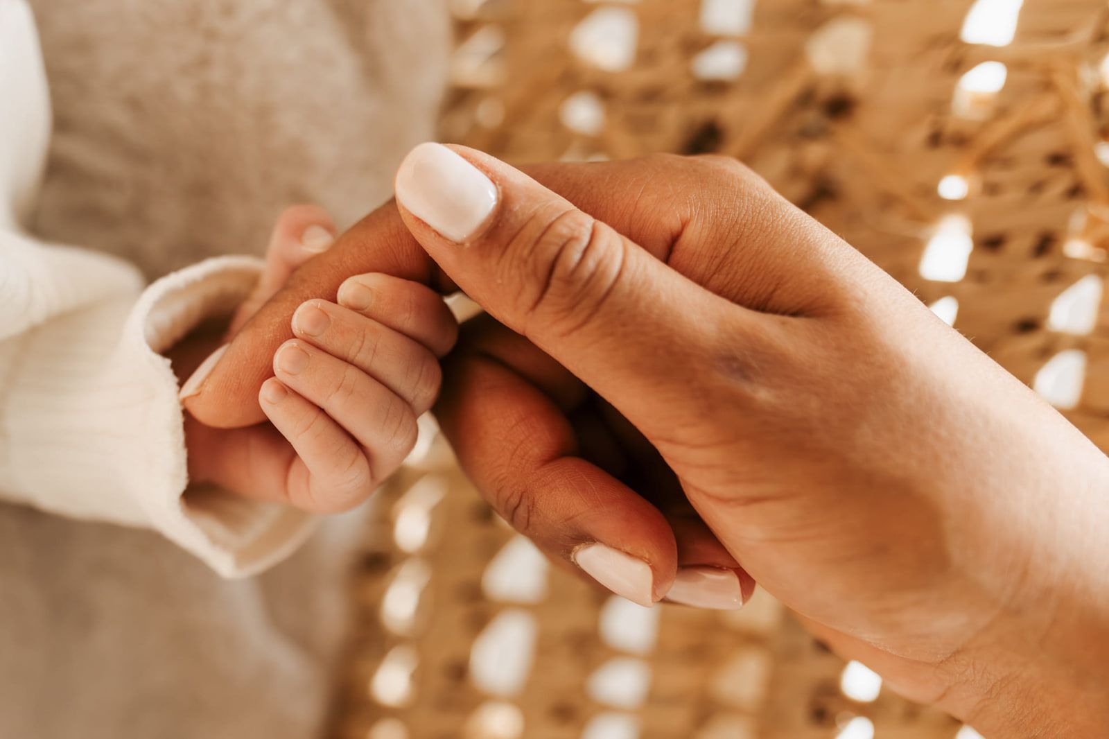 Newborn photography in Langley, BC, newborn holding a parent's finger