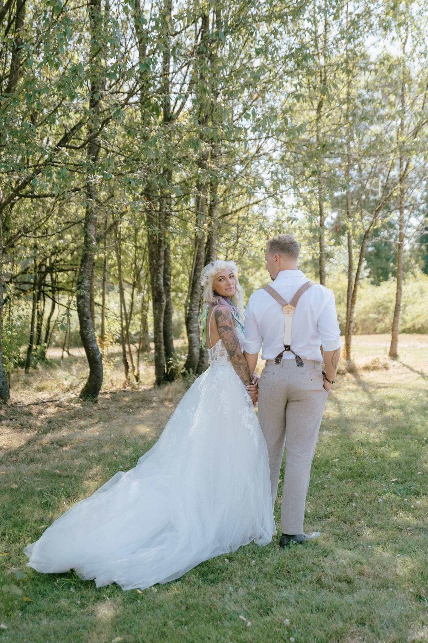 Couple embracing among birch trees